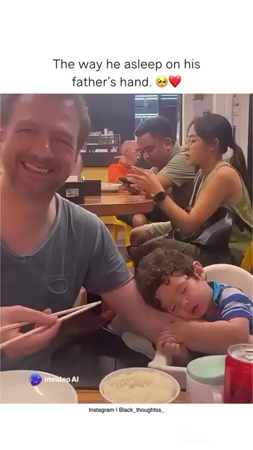 He was sleeping on his father’s hand