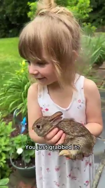 little girl with squirrel